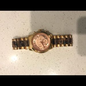 Price Firm-Michael Kors Rose Gold Watch